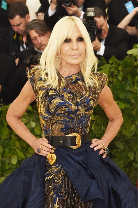 donatella versace famous belt dress|Donatella Versace today images.